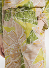 PANTALONE CROPPED IN RASO STAMPATO BEIGE - YELLOW LEAVES | DEHA