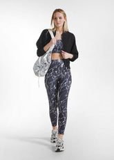 LEGGINGS IN MICROFIBRA CON STAMPA ALLOVER NERO - Activewear | DEHA