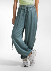 PANTALONI SATINATI MODELLO MAGNUM VERDE - TEAL GREEN | DEHA