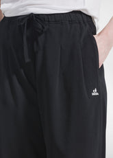 JOGGER PLISSÉ CON DETTAGLIO IN VISCOSA EFFETTO STROPICCIATO NERO - BLACK | DEHA