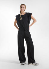 TUTA JUMPSUIT IN JERSEY CON APERTURA SUL RETRO NERO - Vestiti, Gonne e Tute | DEHA