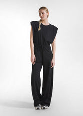 TUTA JUMPSUIT IN JERSEY CON APERTURA SUL RETRO NERO - BLACK | DEHA