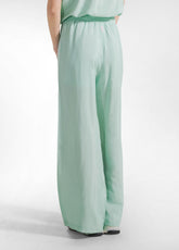 PANTALONI PALAZZO IN SATIN VERDE - JADE GREEN | DEHA