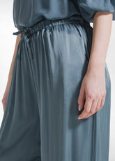 PANTALONI PALAZZO IN SATIN VERDE - TEAL GREEN | DEHA