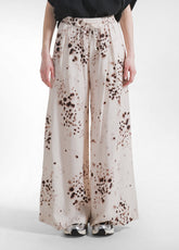 PANTALONI LARGHI IN VISCOSA EFFETTO STROPICCIATO BEIGE - NATURAL DOTS | DEHA