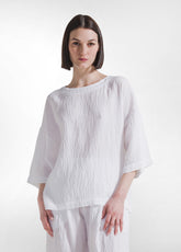 SET WITH OVERSIZED T-SHIRT AND WIDE VISCOSE CRINKLE-EFFECT TROUSERS IN WHITE - | DEHA