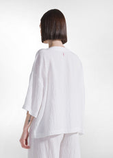 SET WITH OVERSIZED T-SHIRT AND WIDE VISCOSE CRINKLE-EFFECT TROUSERS IN WHITE - | DEHA