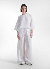 SET WITH OVERSIZED T-SHIRT AND WIDE VISCOSE CRINKLE-EFFECT TROUSERS IN WHITE - Everyday Sets | DEHA