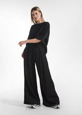 SET WITH OVERSIZED T-SHIRT AND WIDE VISCOSE CRINKLE-EFFECT TROUSERS IN BLACK - Everyday Sets | DEHA