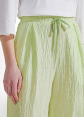 SET WITH OVERSIZED T-SHIRT AND WIDE VISCOSE CRINKLE-EFFECT TROUSERS IN YELLOW - Everyday Sets | DEHA