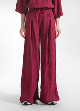 PANTALONI LARGHI IN VISCOSA EFFETTO STROPICCIATO ROSSO - CHERRY RED | DEHA