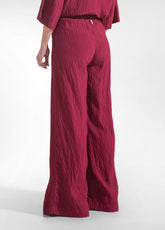 PANTALONI LARGHI IN VISCOSA EFFETTO STROPICCIATO ROSSO - CHERRY RED | DEHA