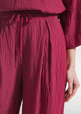 PANTALONI LARGHI IN VISCOSA EFFETTO STROPICCIATO ROSSO - Best Sellers | DEHA