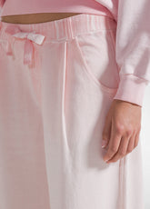 SET AUS SWEATSHIRT MIT RUNDHALSAUSSCHNITT UND WIDE LEG HOSE MIT ROSA FARBVERLAUF-EFFEKT - Comfort Sets & Anzüge | DEHA