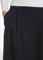 GONNA CON PIEGHE EFFETTO MATELASSÉ NERO - Leisurewear | DEHA