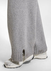 COMPLETO MAGLIONE LUNGO E PANTALONE IN MAGLIA CON PAILLETTES GRIGIO - | DEHA