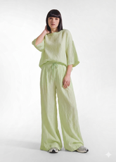 SET WITH OVERSIZED T-SHIRT AND WIDE VISCOSE CRINKLE-EFFECT TROUSERS IN YELLOW - Everyday Sets | DEHA